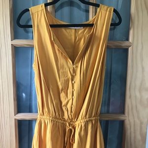 NWOT mustard colored romper size medium!
